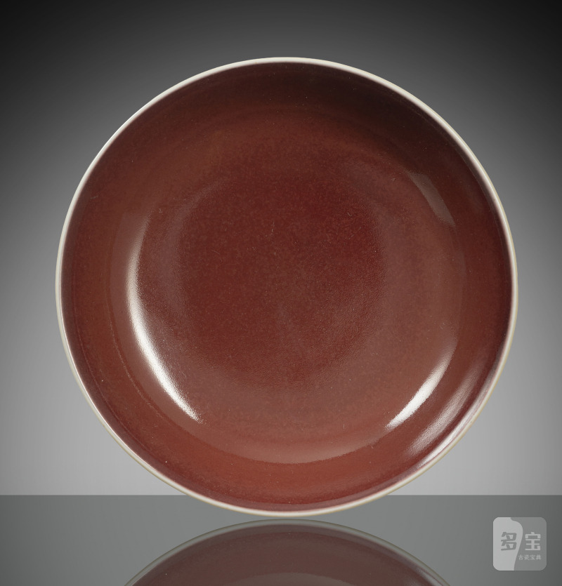 An Imperial porcelain 'saucer' with copper-red glaze